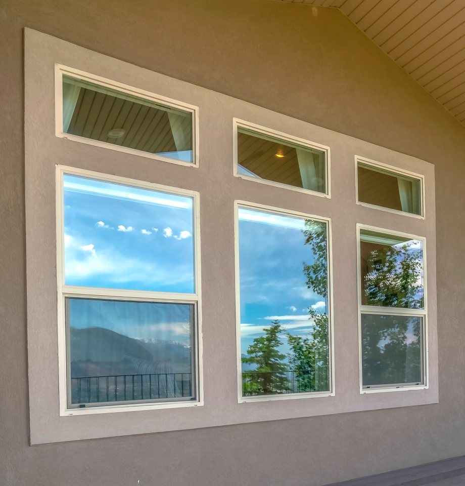 Residential home with stone style siding