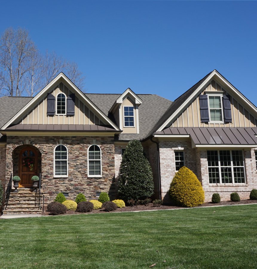 Residential home with stone style siding