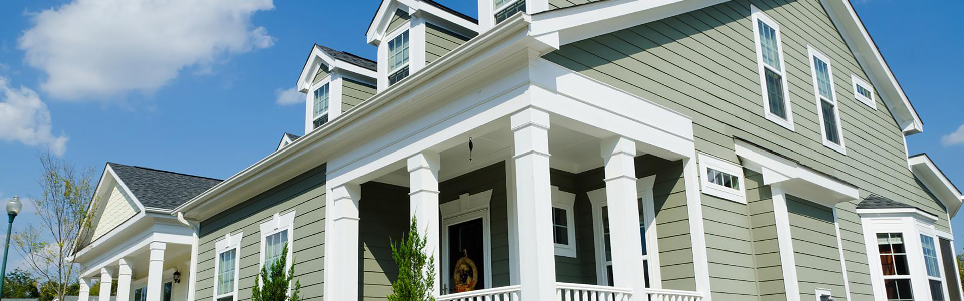 Mid-class home with green siding